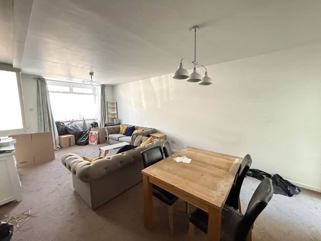 Lot: 35 - THREE-BEDROOM HOUSE WITH STRUCTURAL DAMAGE - Open plan living and dining room